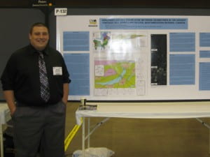 Ernie presents his poster at the Geological Society of America Annual Meeting in Minneapolis.